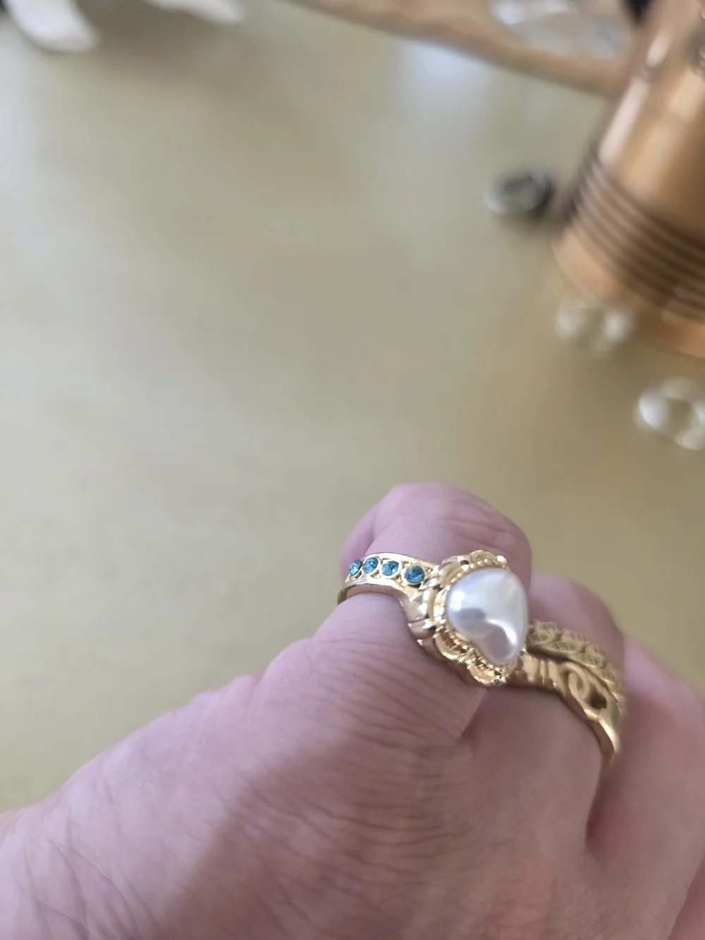 Gold White Pearl Teardrop Ring with Blue Accent  Stones